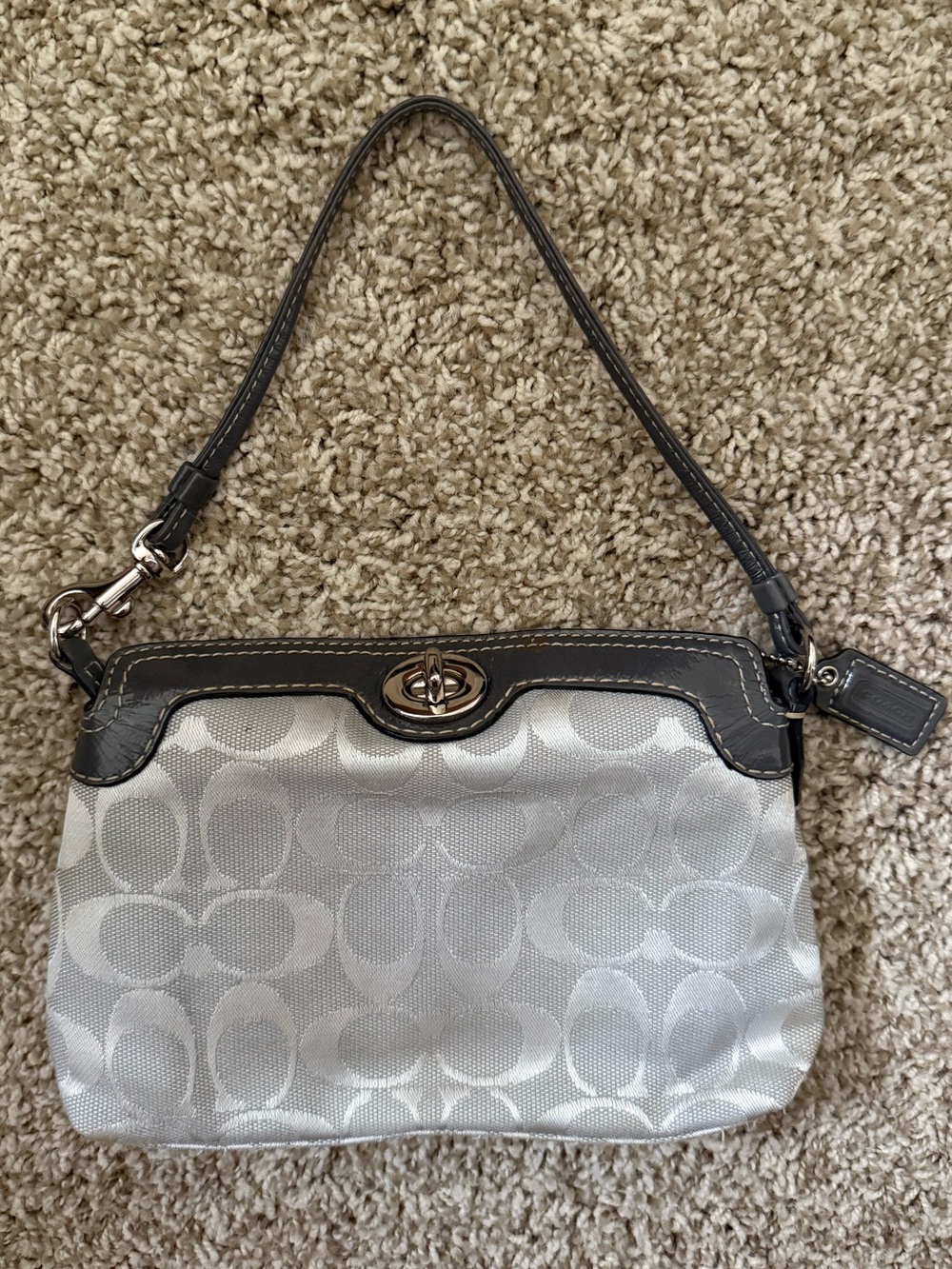 Coach Silver Signature Canvas Wristlet with Black Trim and Turn-Lock